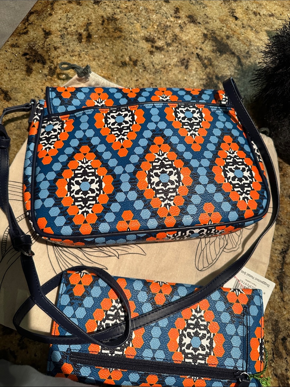 Vera Bradley crossbody bag and matching wallet.
